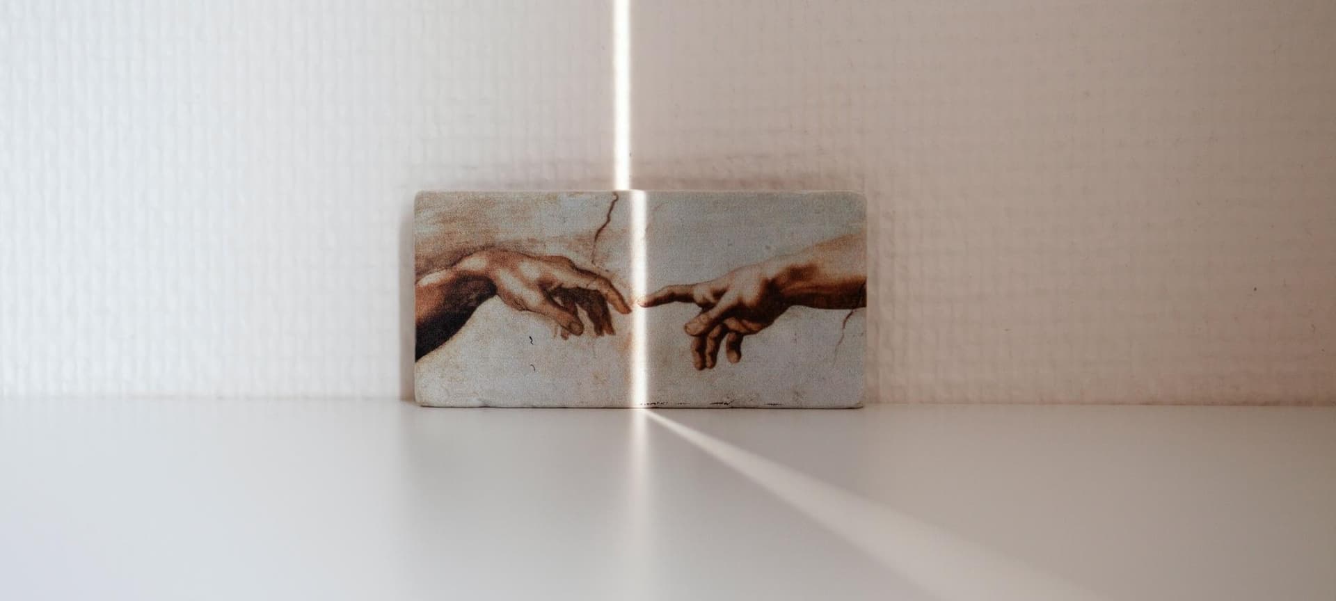 Close up of Michelangelo's painting "The Creation of Adam"