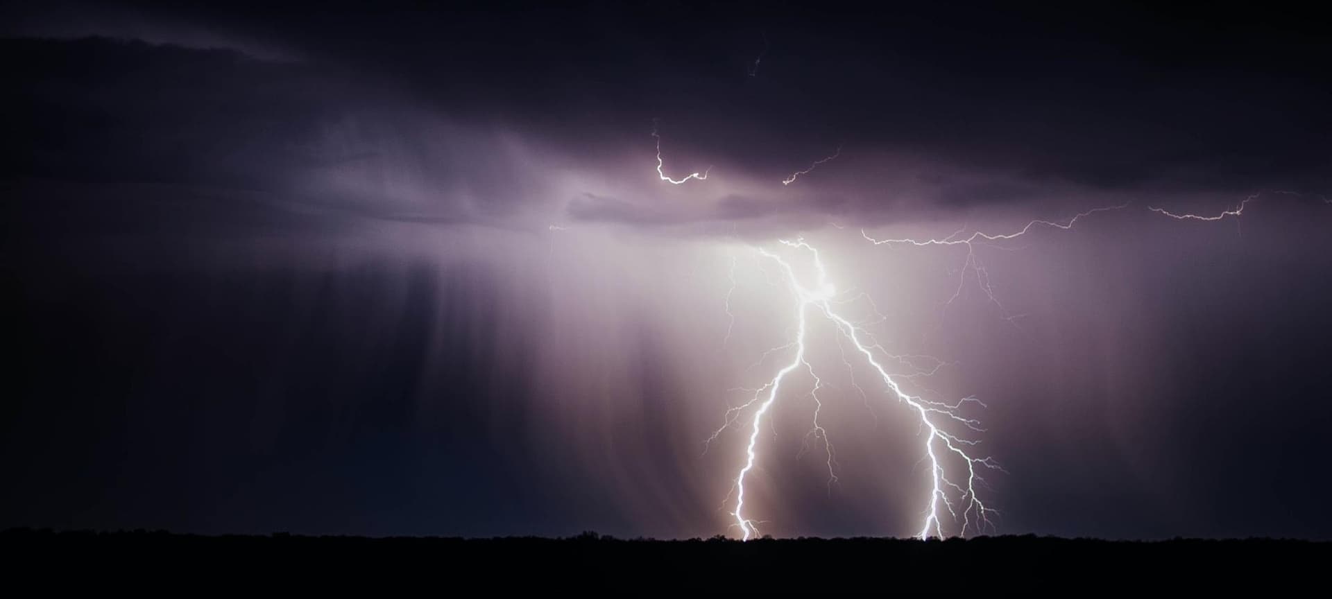 lightening against dark clouds
