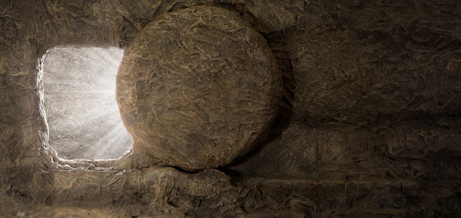 tomb with stone rolled away
