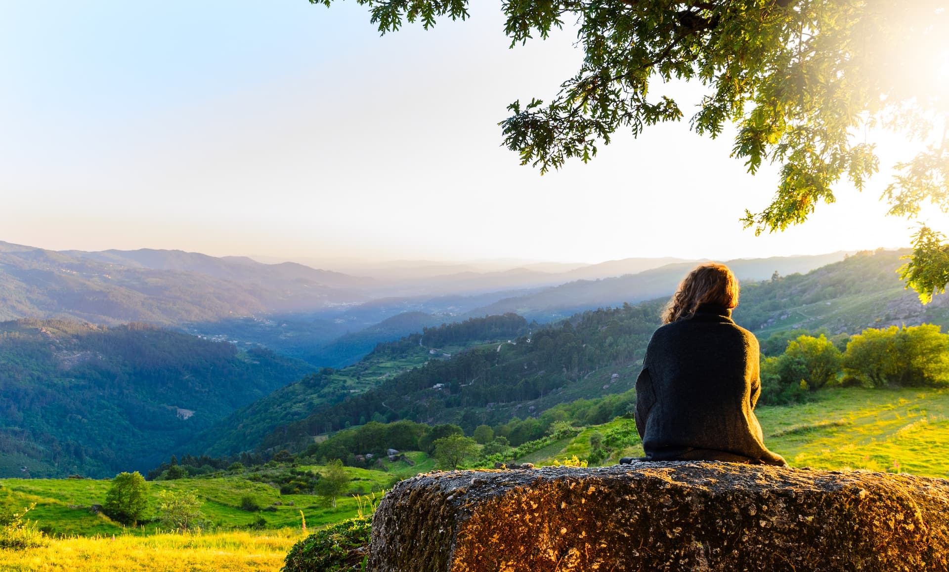 Woman sitting and admiring nature
