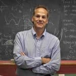 marcelo gleiser in front of chalk board