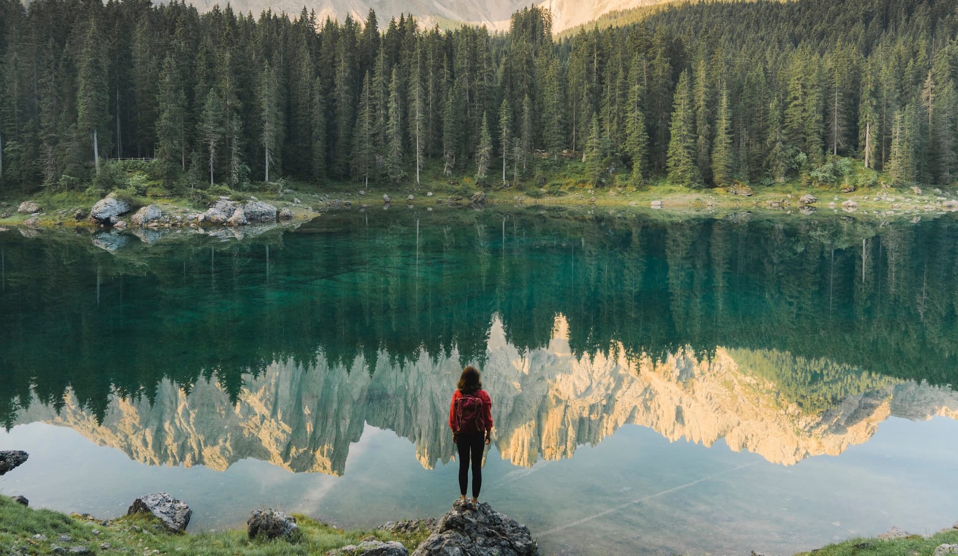 woman in the mountains at a lake