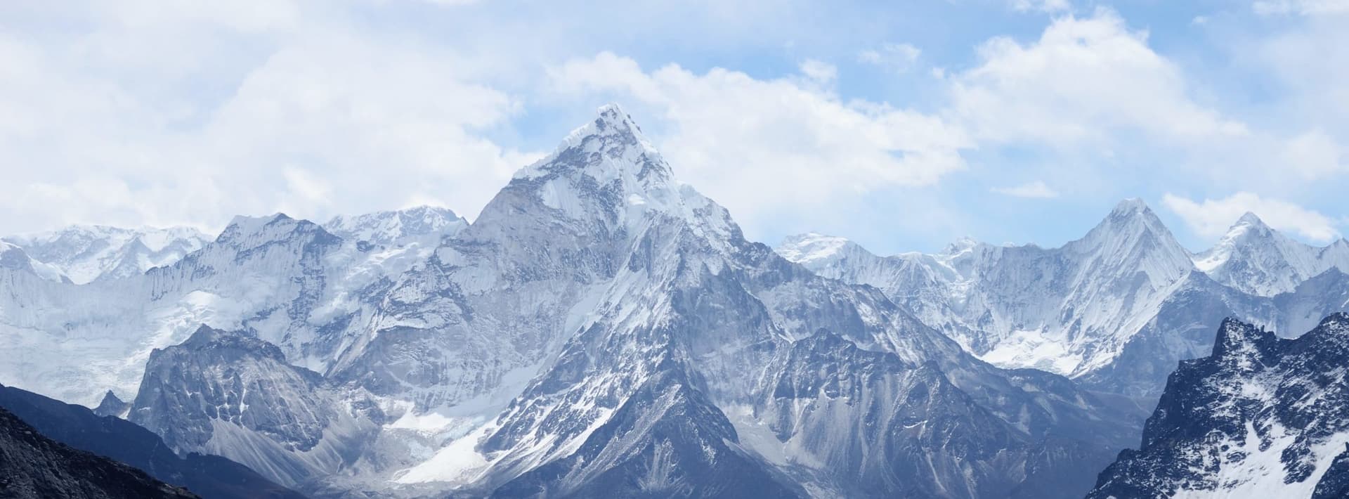 mountains and a blue sky with clouds