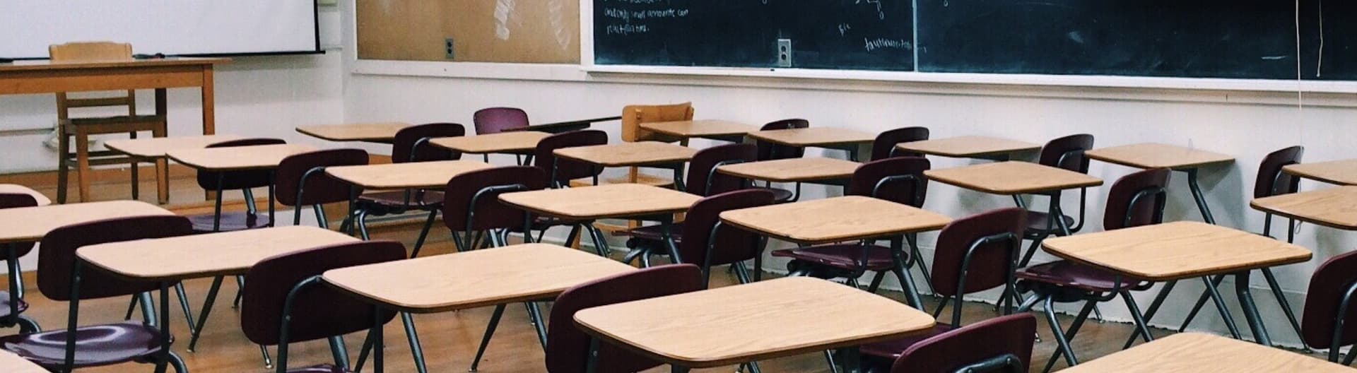 empty classroom with desks