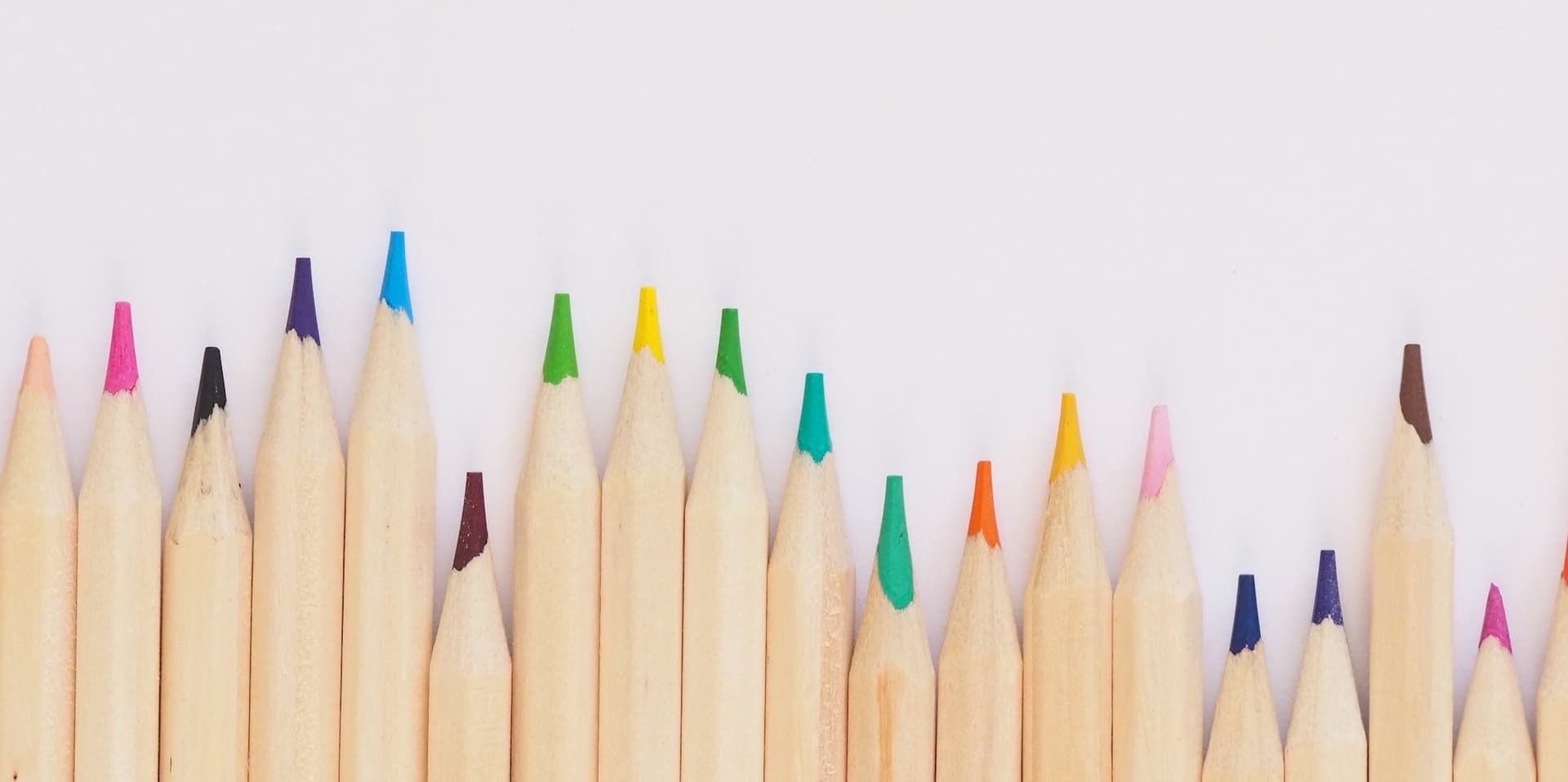 colored pencils sharpened in a line