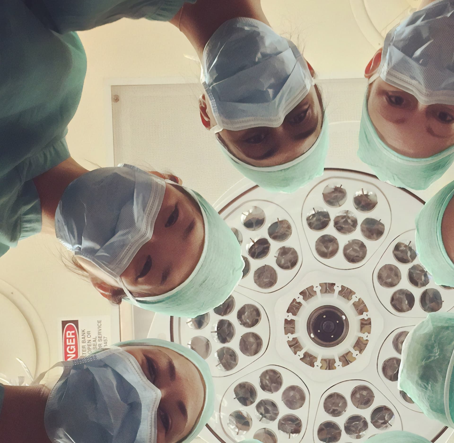 doctors in masks standing in a circle