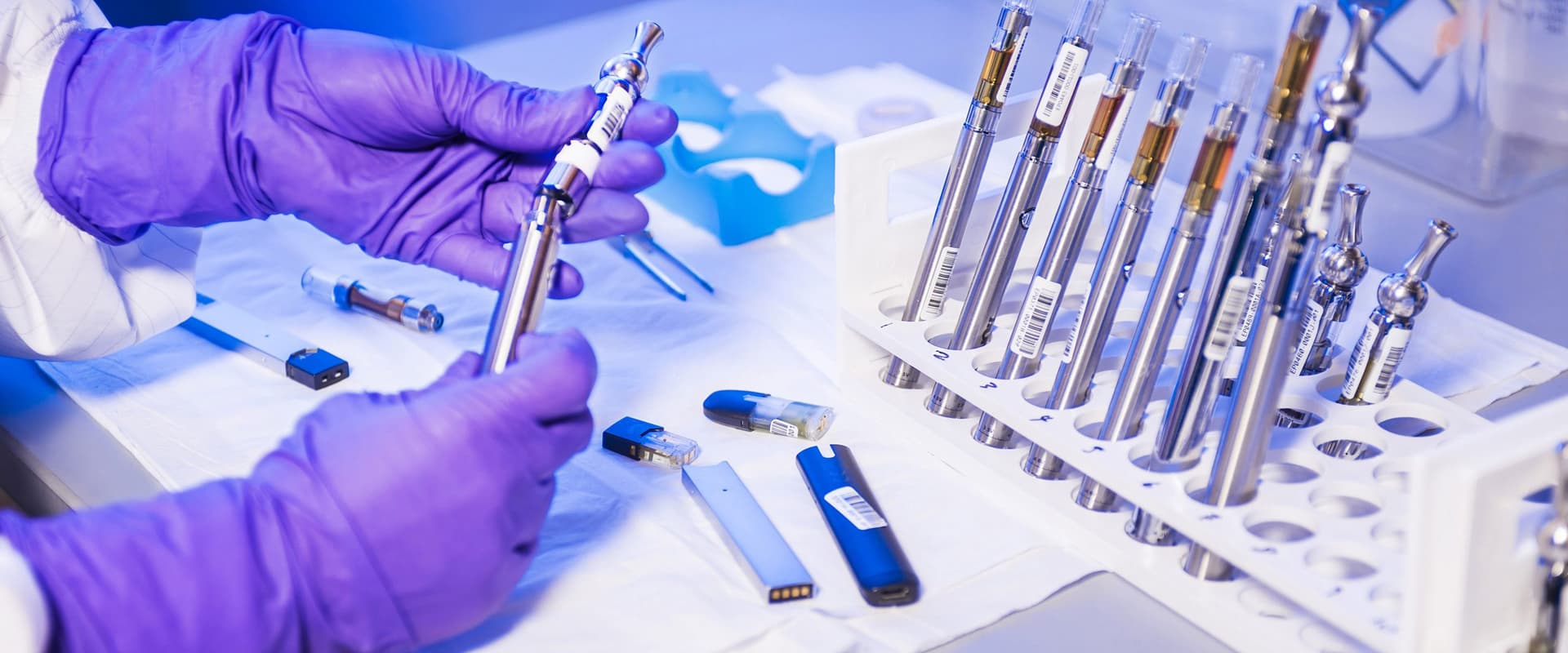 gloved hands in laboratory