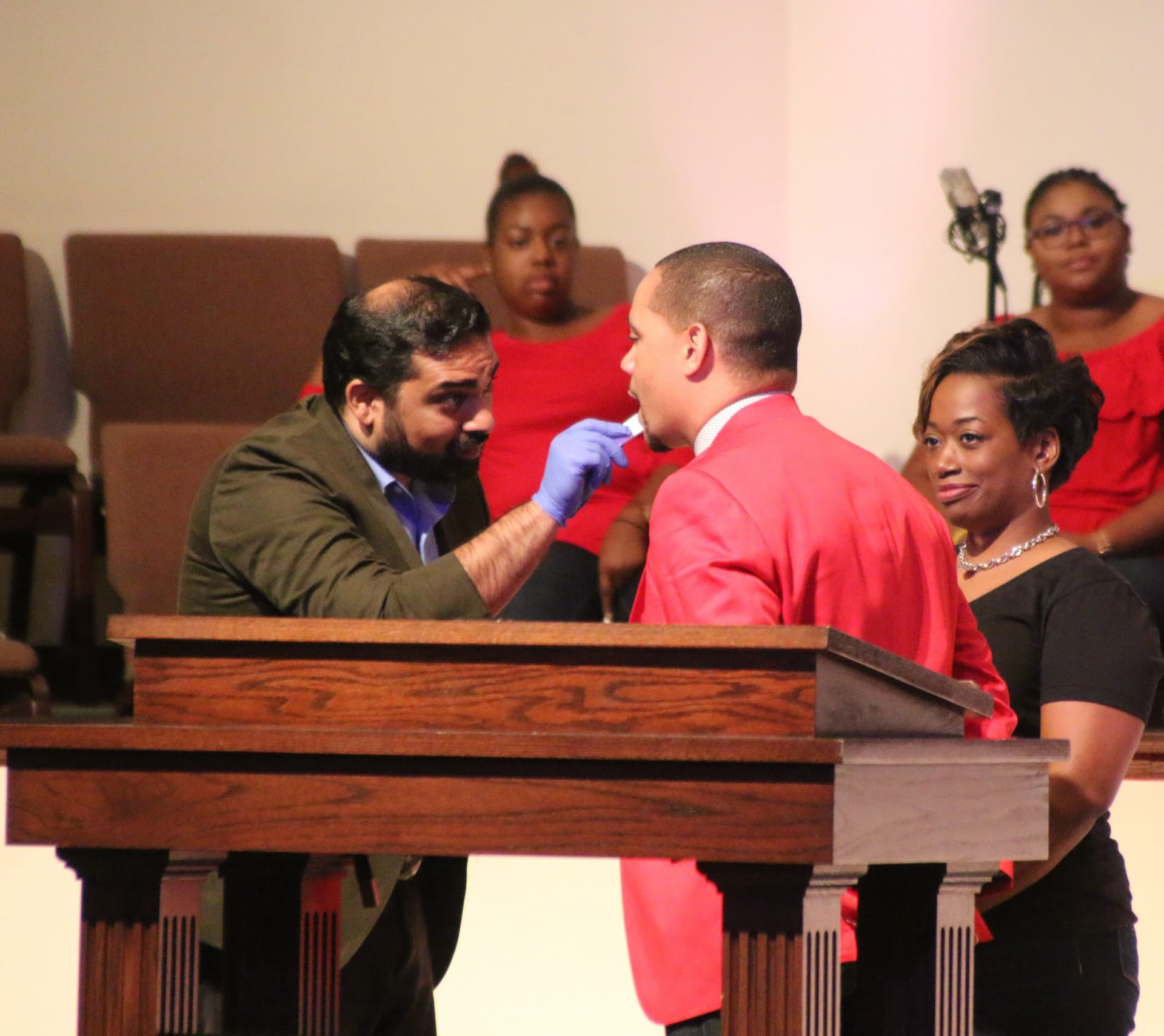 Pastor Faison getting HIV tested at church