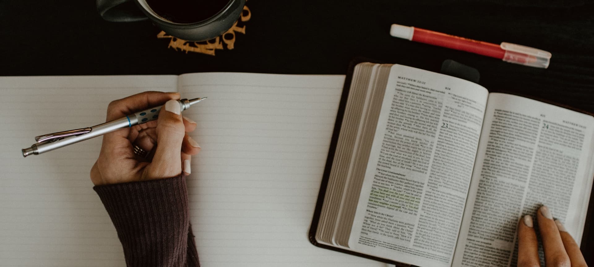 writer reflecting on bible passage and writing notes