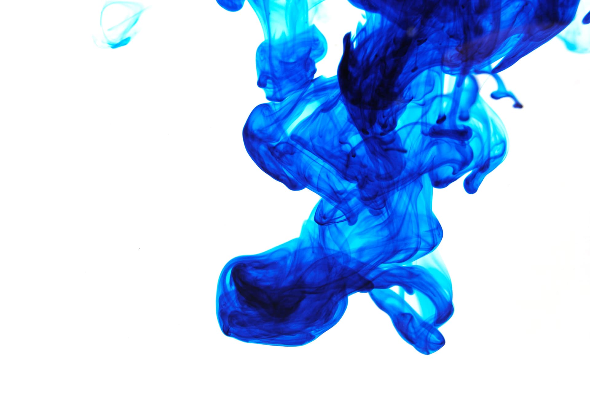 blue dye diffusing in water