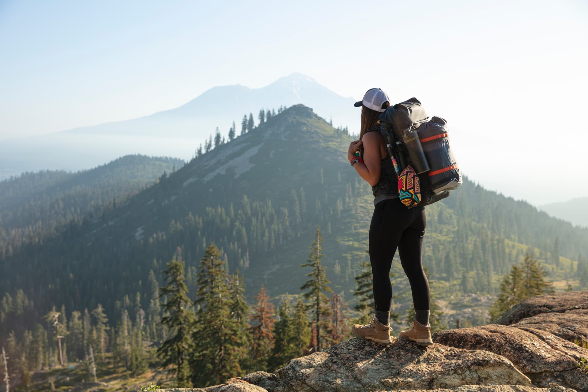 Person hiking on mountain trial