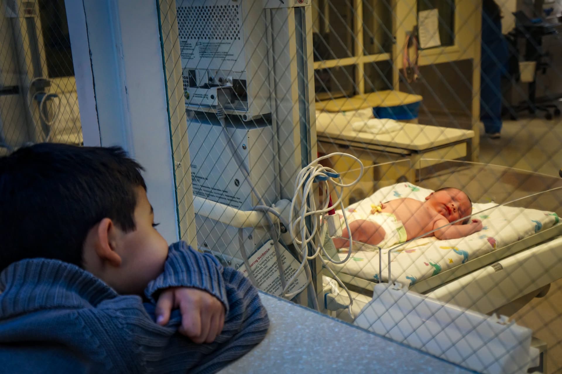 Older brother watching Baby brother in NICU