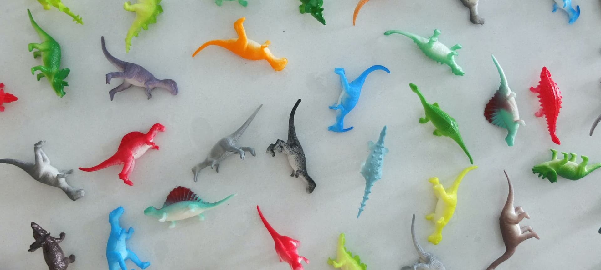 Assortment of colorful dinosaur toys