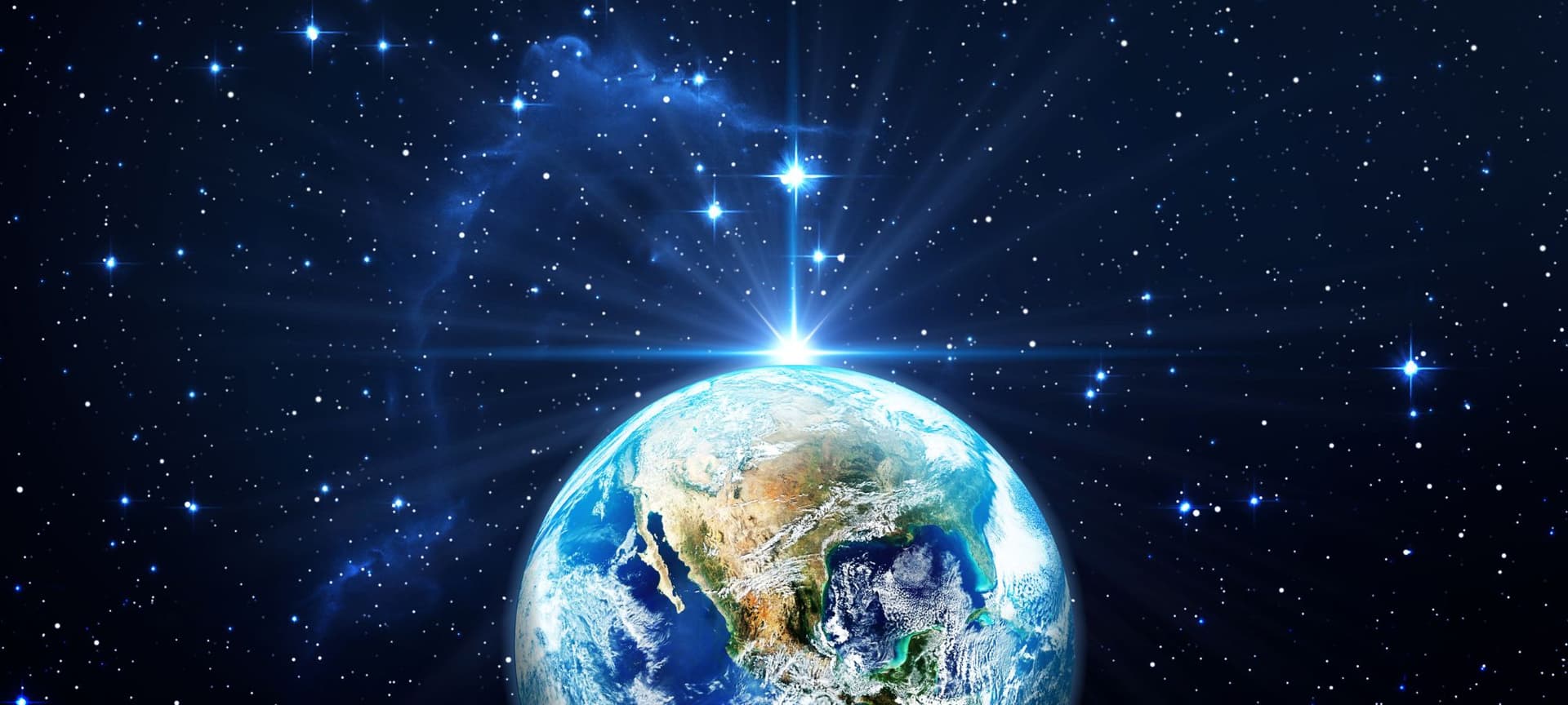 Beautiful image of planet Earth in space from a distance, surrounded by stars, some dim and other bright. One very bright star emerges on top of planet earth