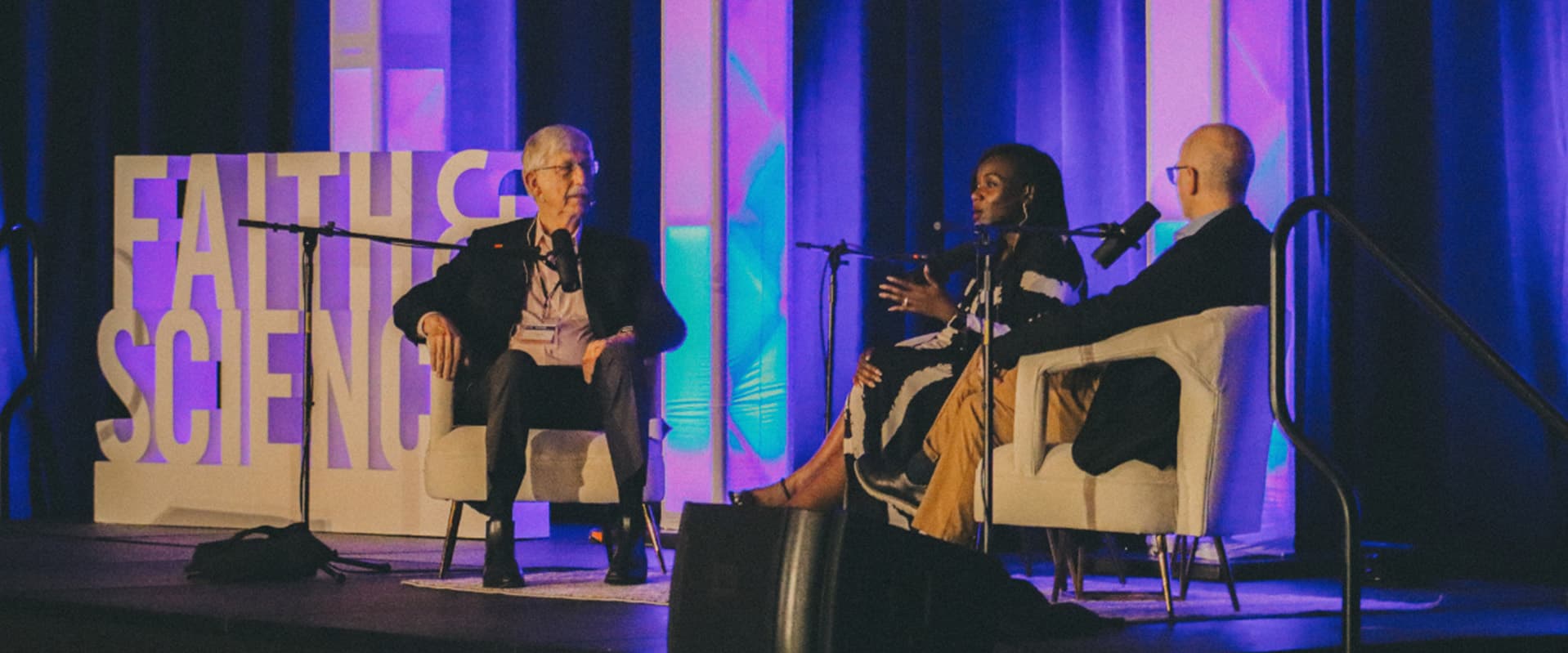 Collins. Corbett & Stump on stage at Faith & Science 2024