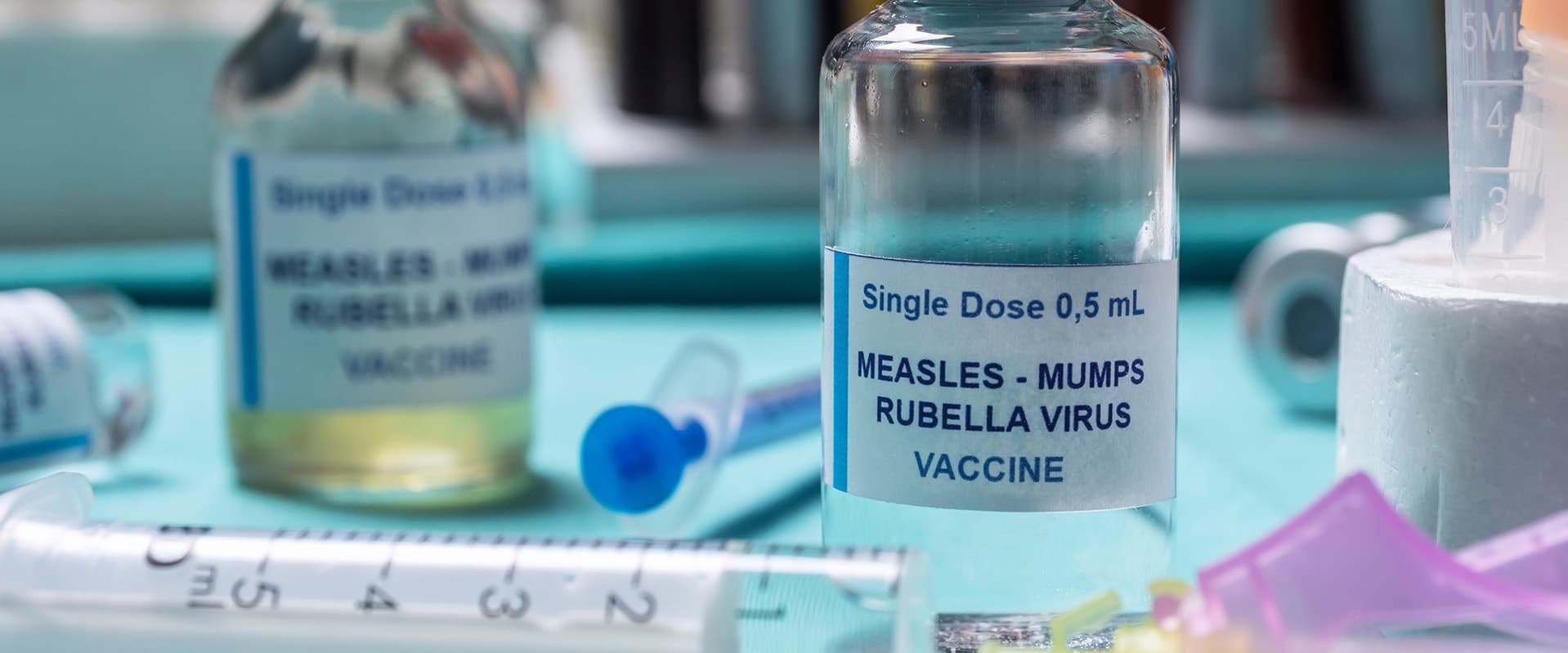 MMR vaccine bottle and other medical equipment