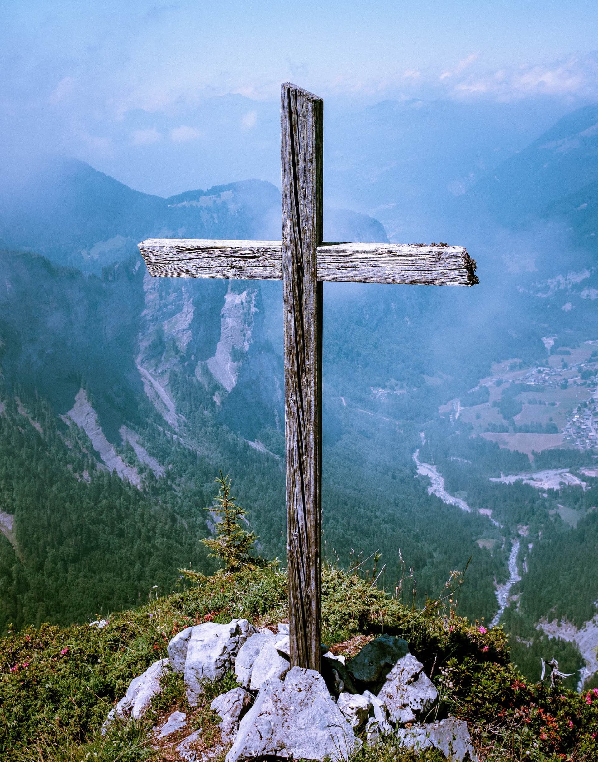 wooden cross on a hill