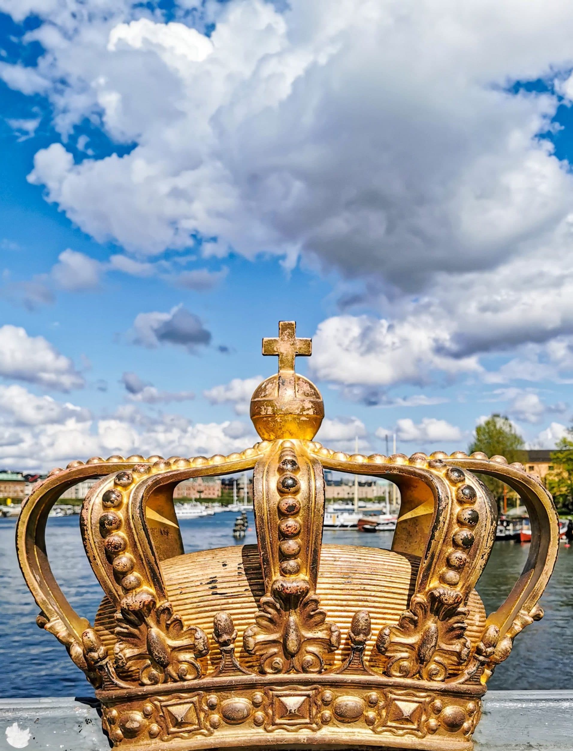 gold crown against a blue sky