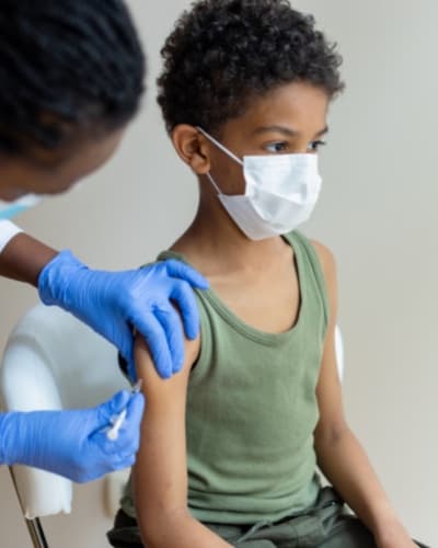 Chlid getting vaccinated