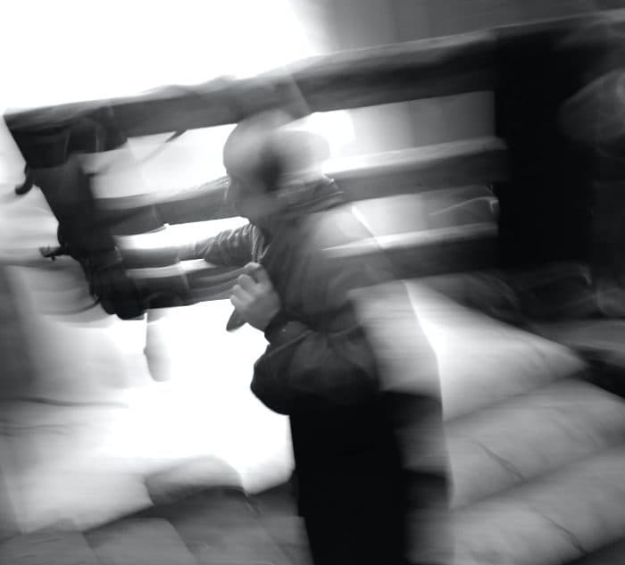 Man carrying something by himself