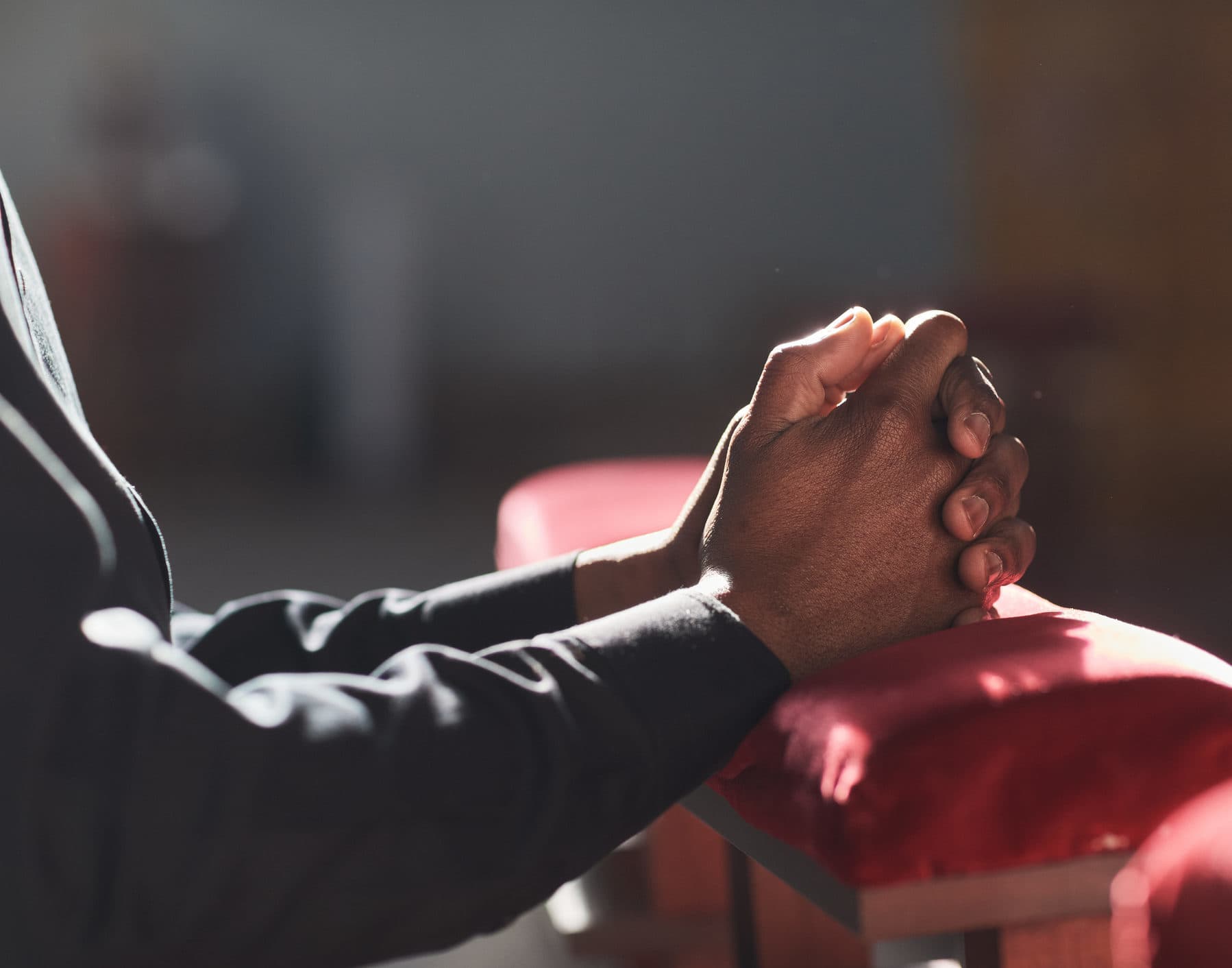 Hands folded in prayer