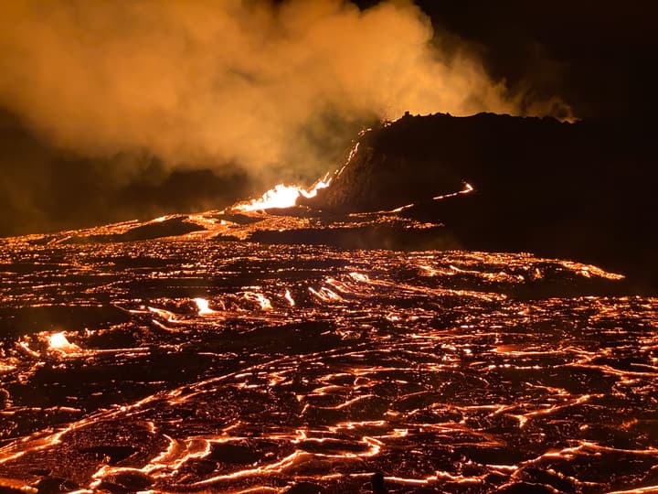 Close-up photo of lava near an erupting volcano